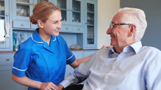 An adult nursing student with a patient