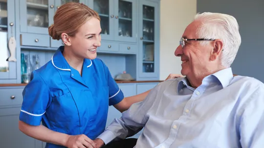 An adult nursing student with a patient
