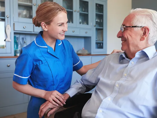 An adult nursing student with a patient