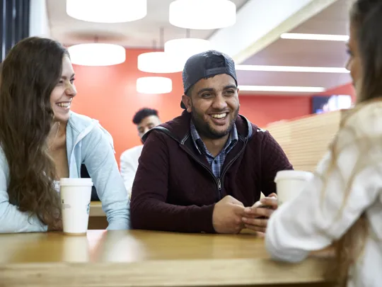 Students Enjoying Coffee at McIntyre House EatSpace at University College Birmingham