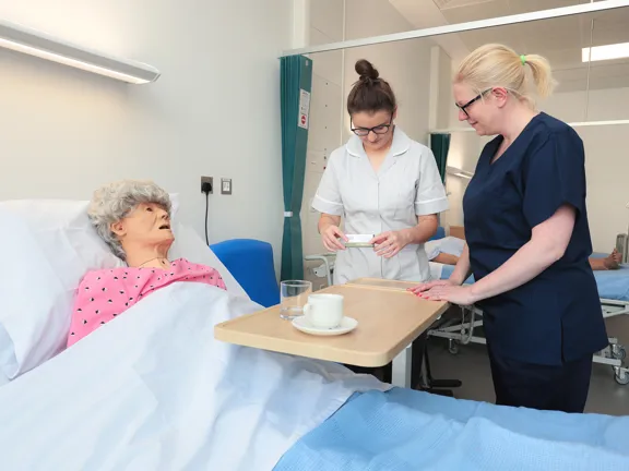 Adult nursing student and a teacher at the Health Suite Moss House