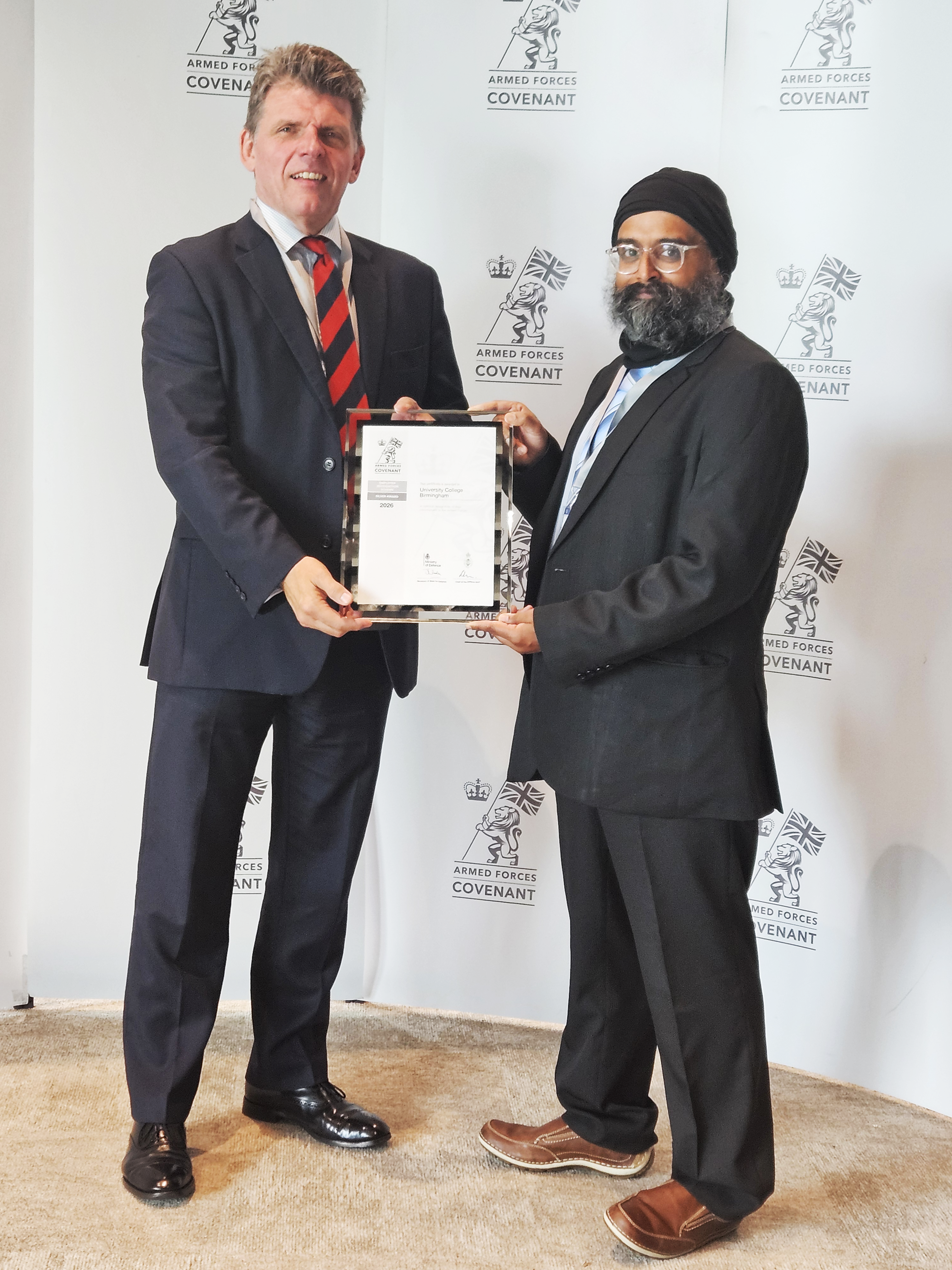 UCB's David Paulson and Supinder Singh Varaitch pictured with the Defence Employer Recognition Scheme Silver Award.
