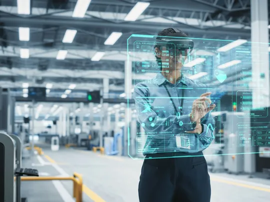 Person using AI and virtual googles within manufacturing process