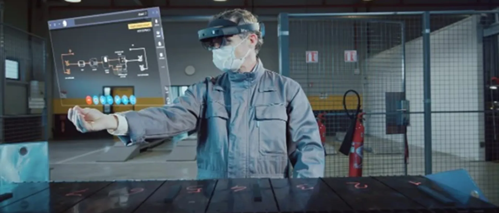 Person using AI within manufacturing holding a virtual screen with AI google on.