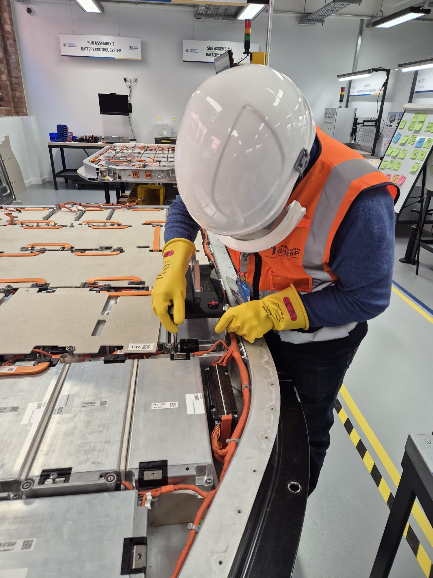 Student working on a battery.
