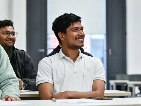 A student in a lecture session at University College Birmingham