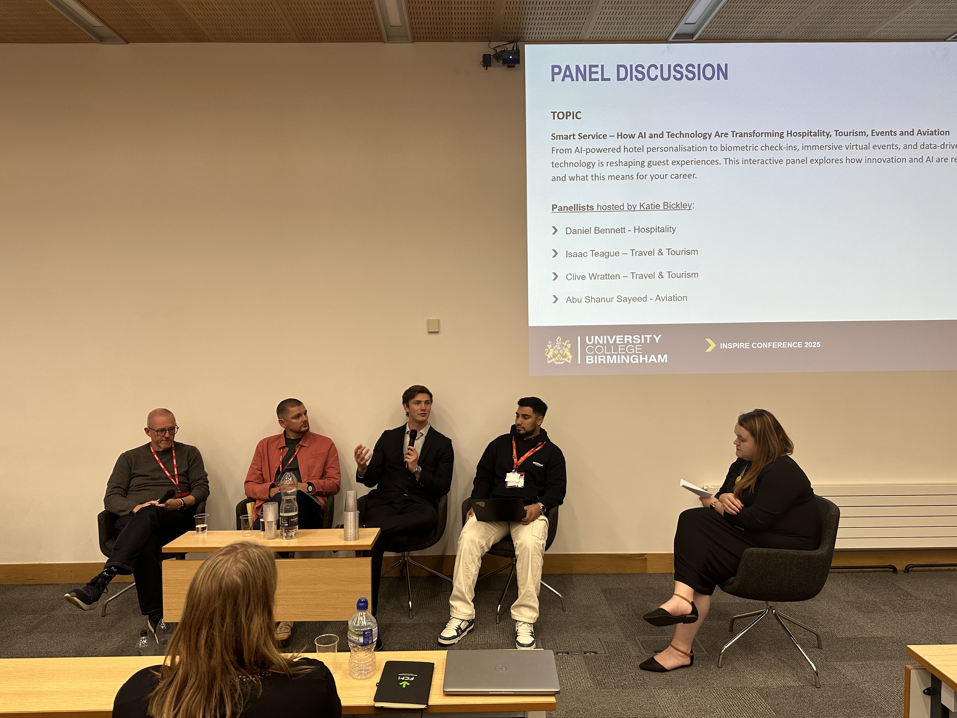 Alumni student and Clive from BTA discussing key issues in hospitality and tourism