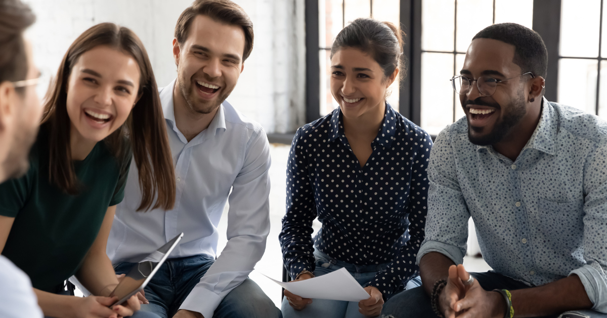 Group of older professional students laughing.