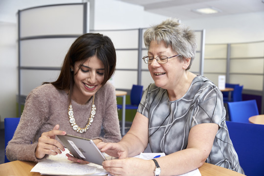 Student and a tutor at the Centre for Academic Skills and English - University College Birmingham